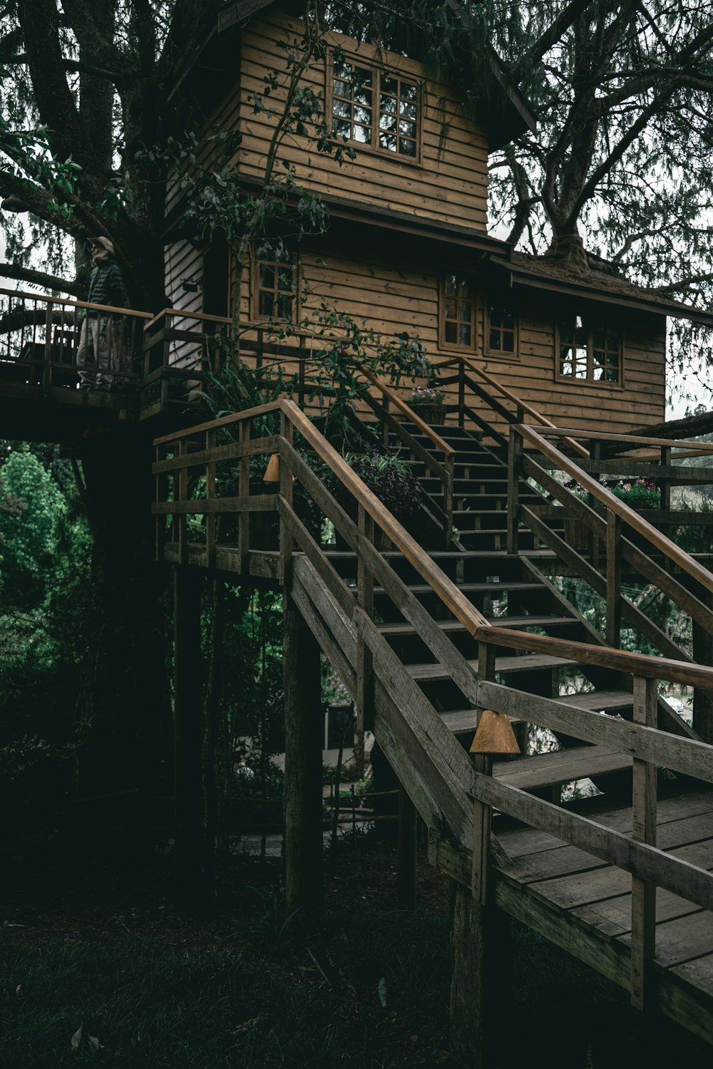 a wooden house with a staircase