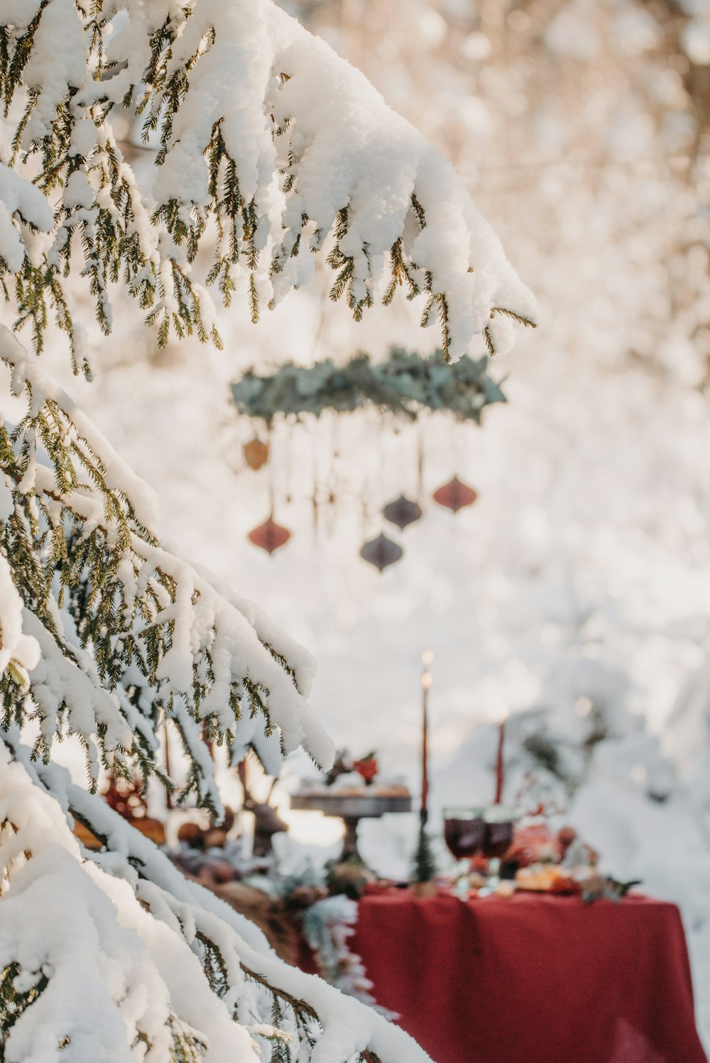 a snowman with a red table and a red table