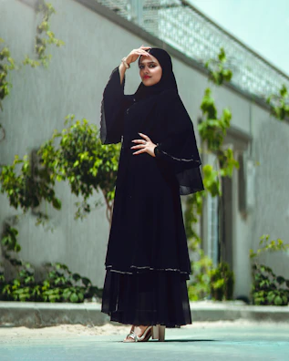 a woman in a black dress