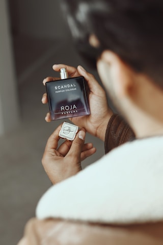 a person holding a small device