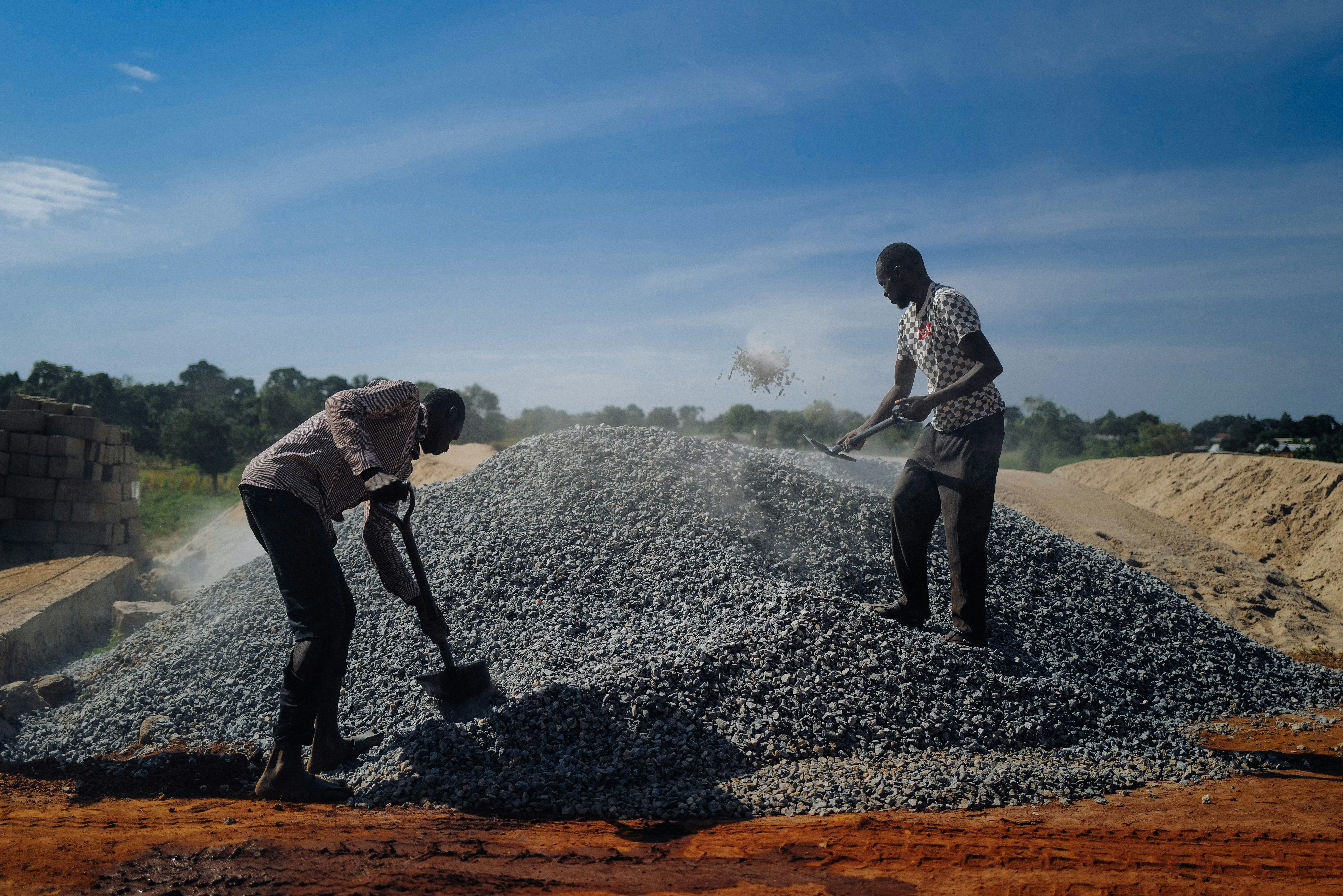 two people spraying water, 