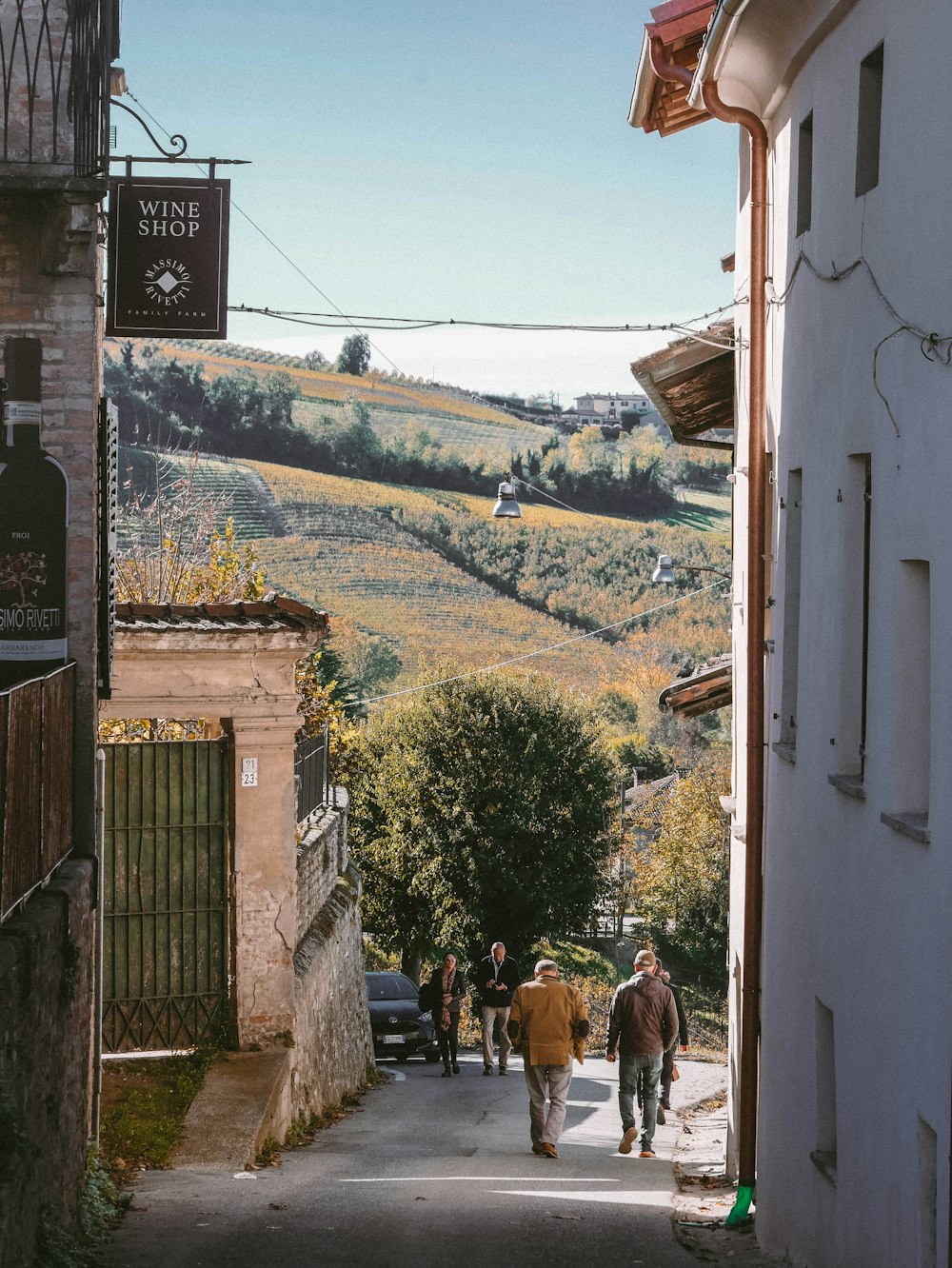 people walking down a street