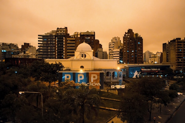 A nighttime image of the illuminated Córdoba skyline.