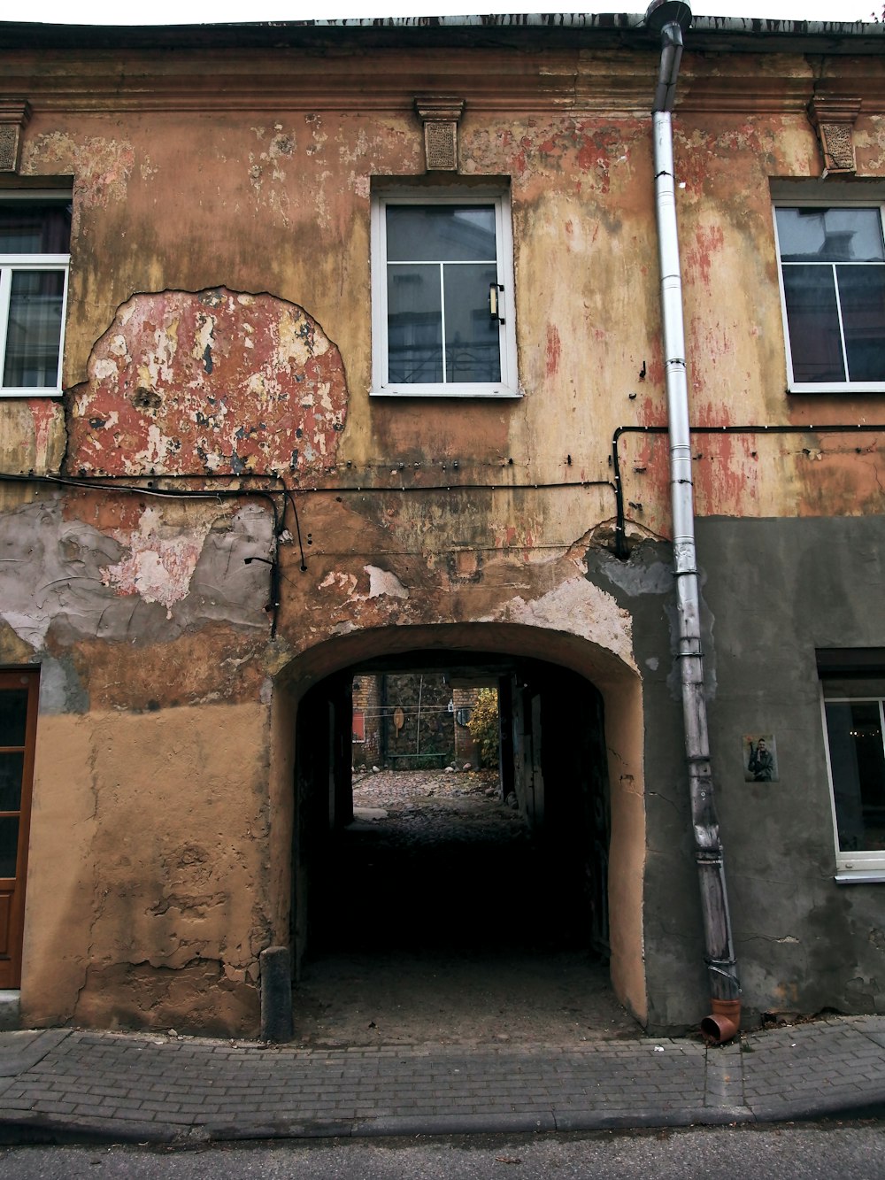 a brick building with a door