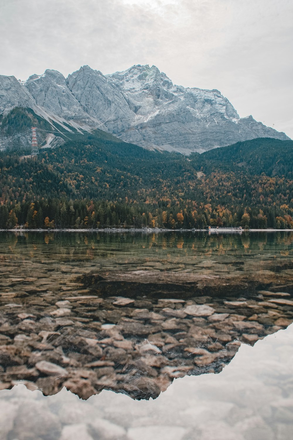 a lake with a mountain in the background