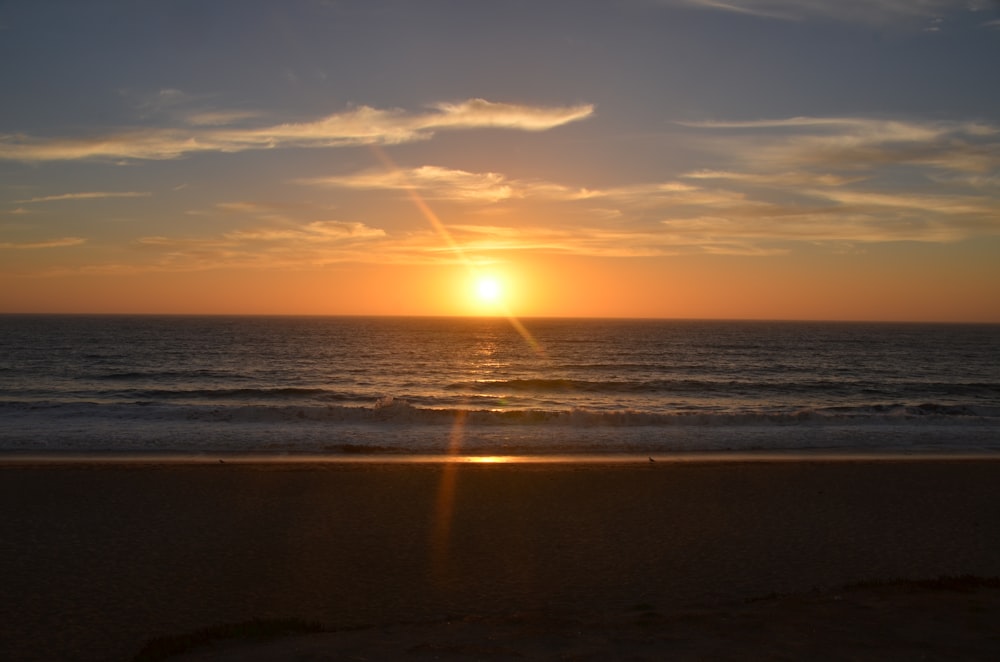 a sunset over the ocean