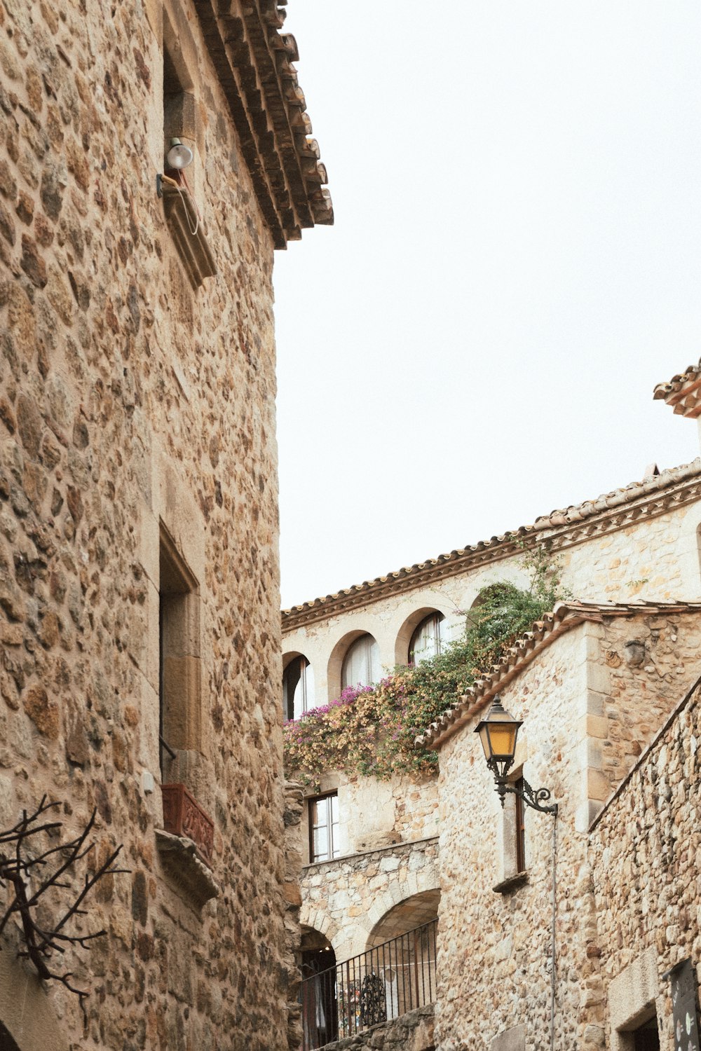 a stone building with a gate