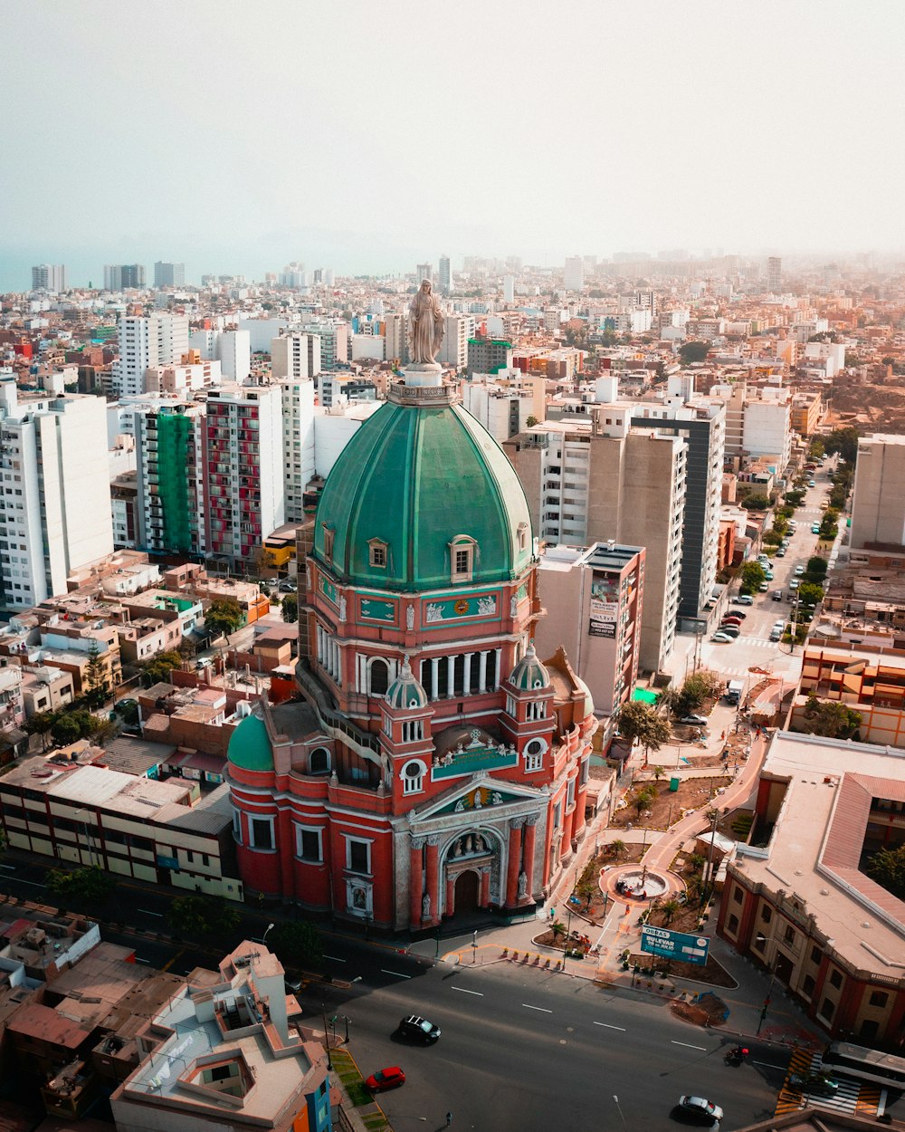 a large red building in a city