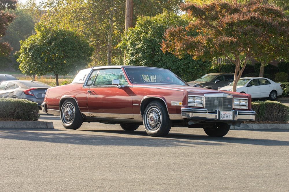 a red car parked on the side of the road