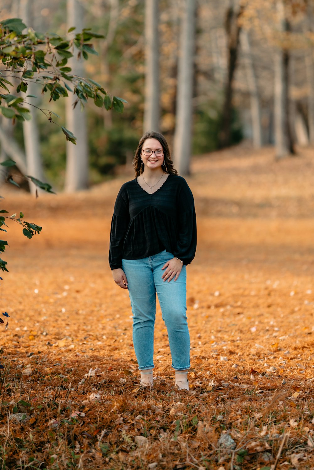 a person standing in a forest