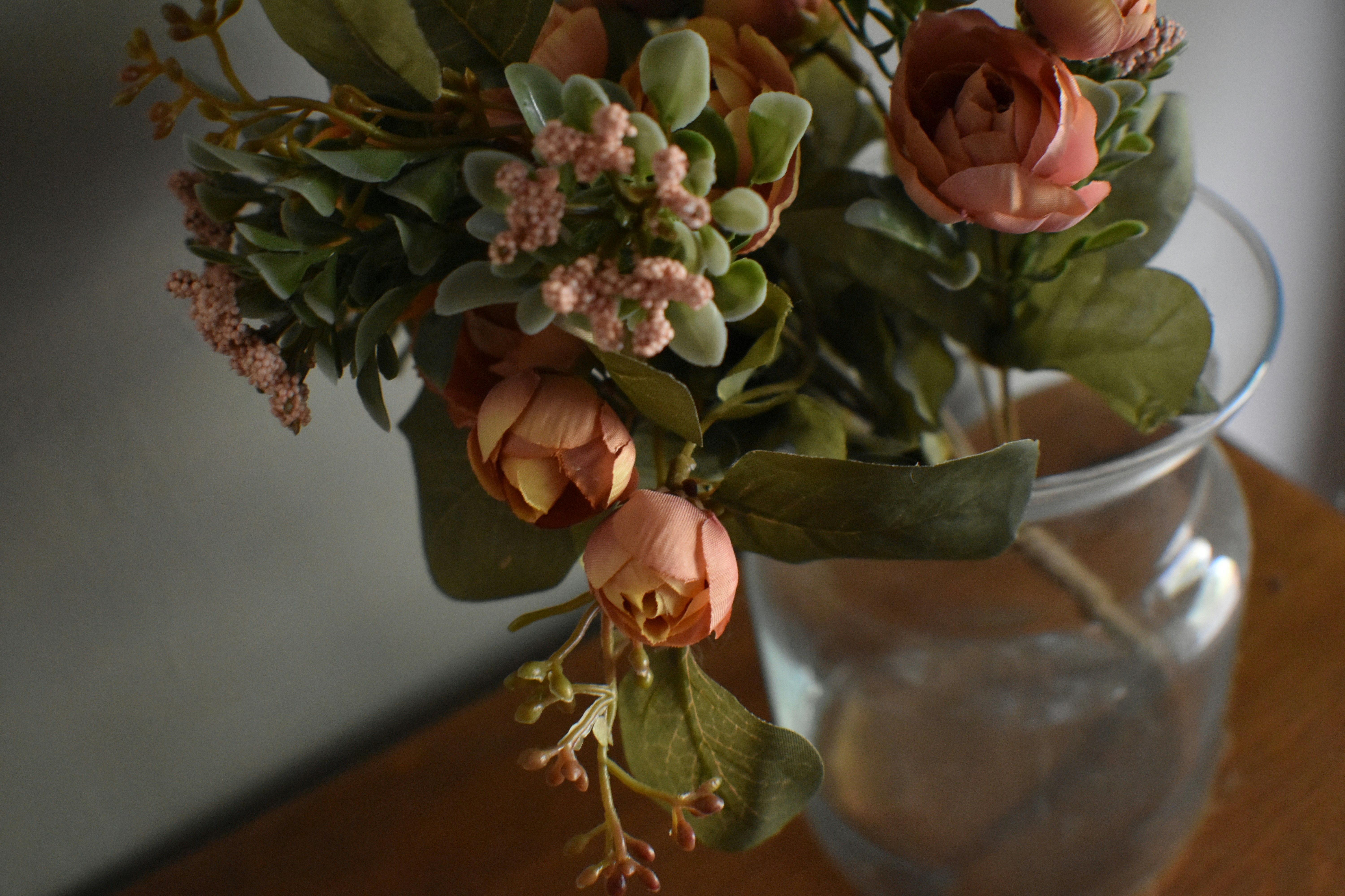 Flower arrangement on nightstand