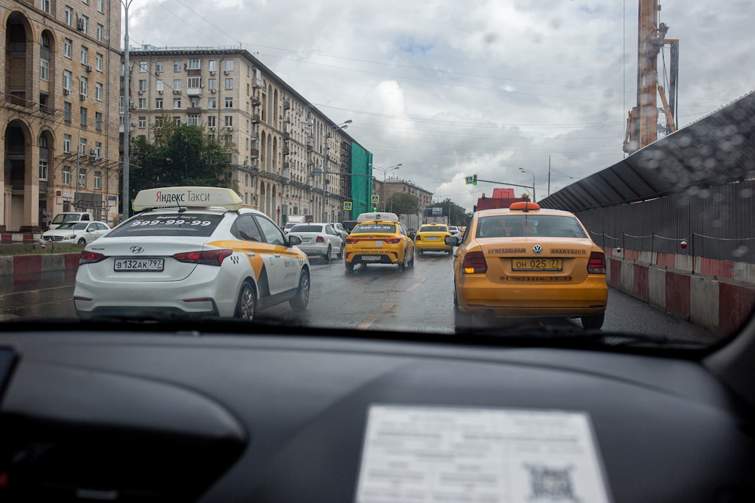 a group of cars on a road,