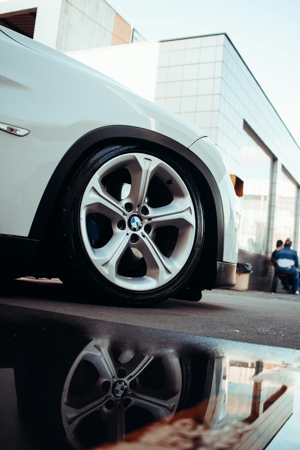 a car with a large wheel