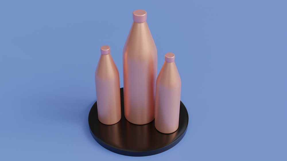 a group of pink and white bottles
