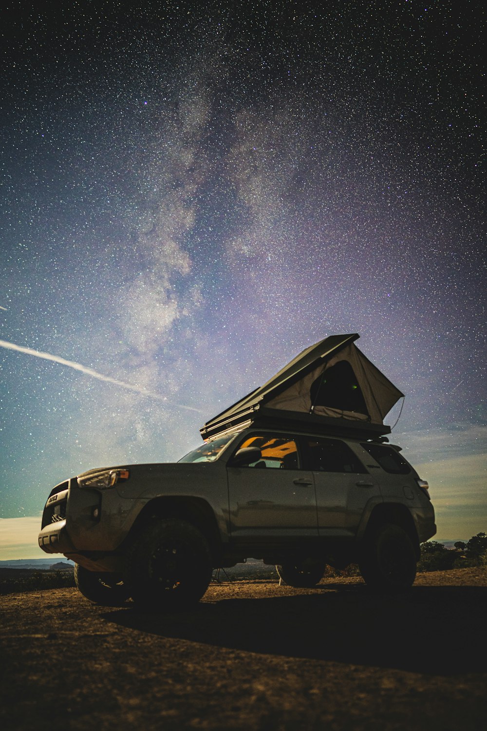 a car with a tent on top