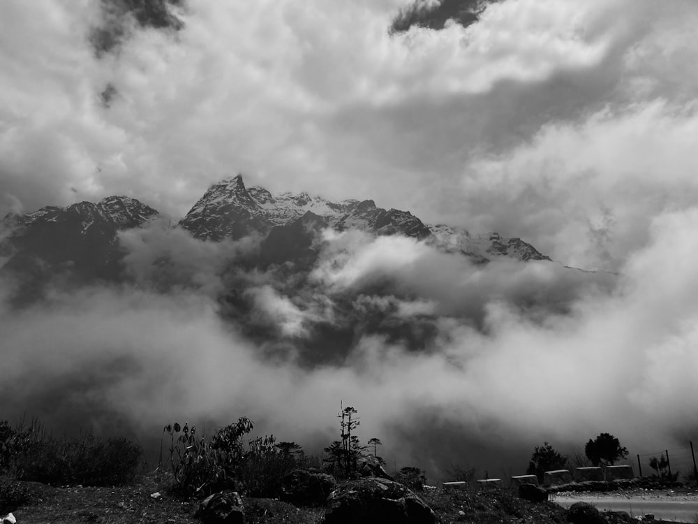 a mountain range with clouds