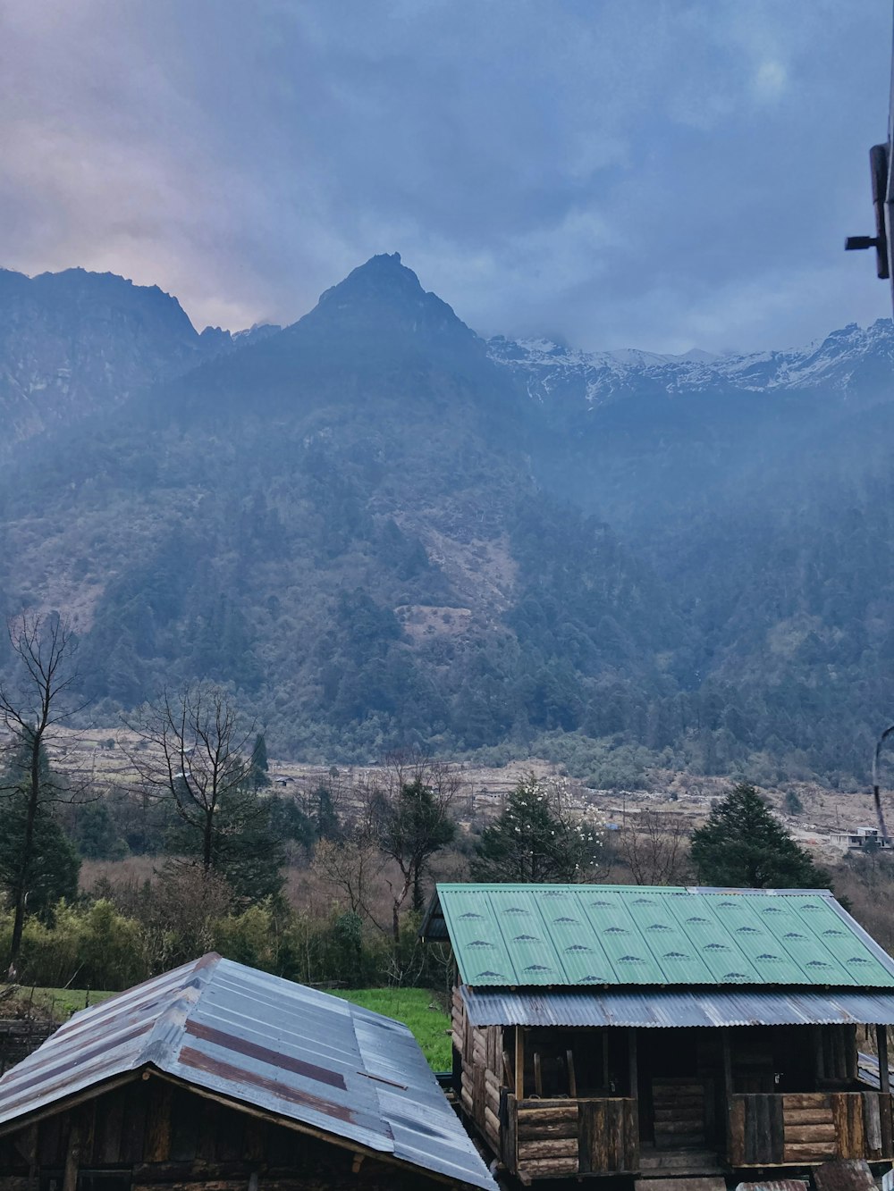 a view of a mountain range from a building