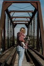 a person walking on a train track