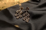 Elegant oxidized earrings showcased on a velvet background.