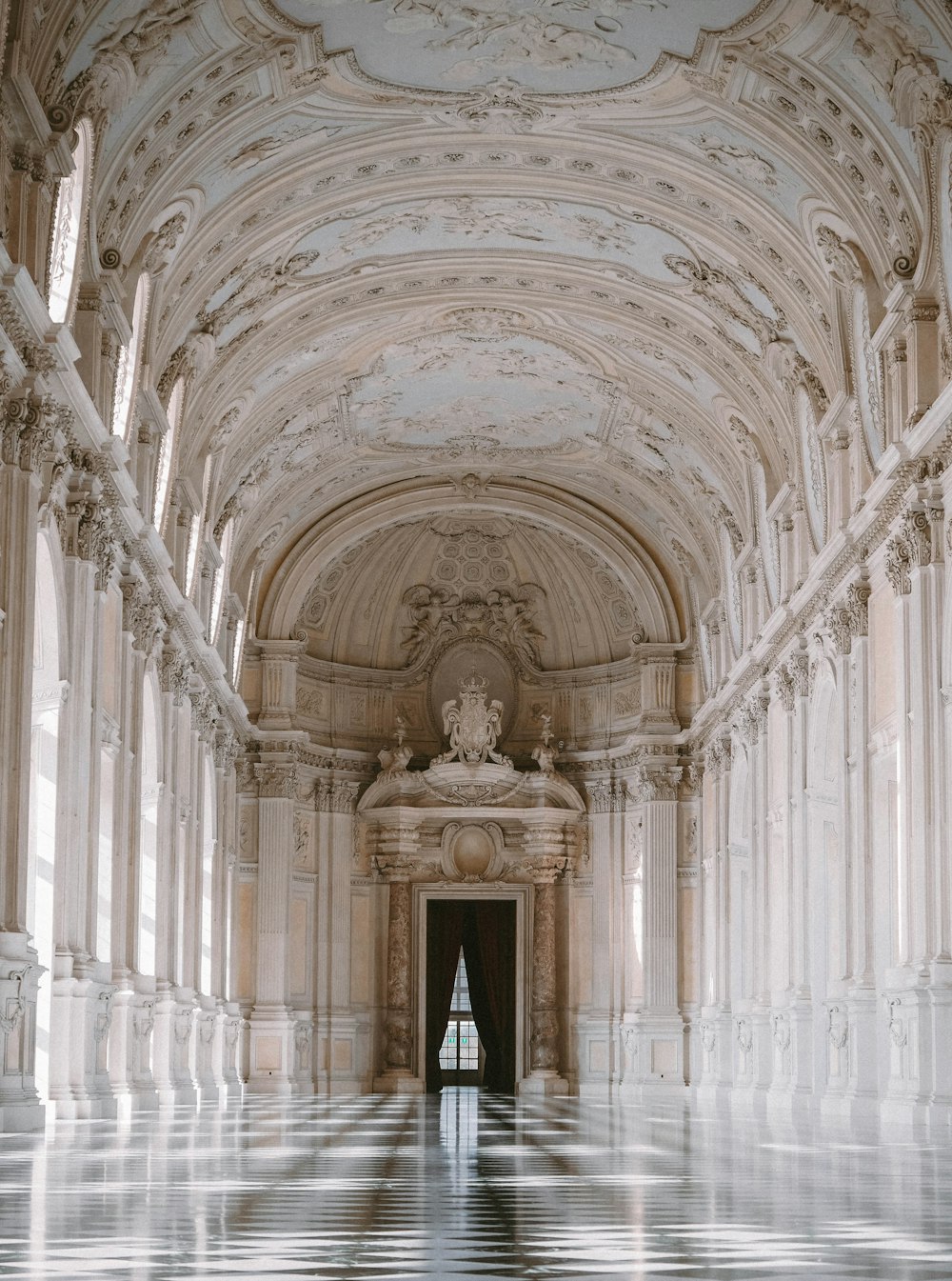 a large ornate room with a door