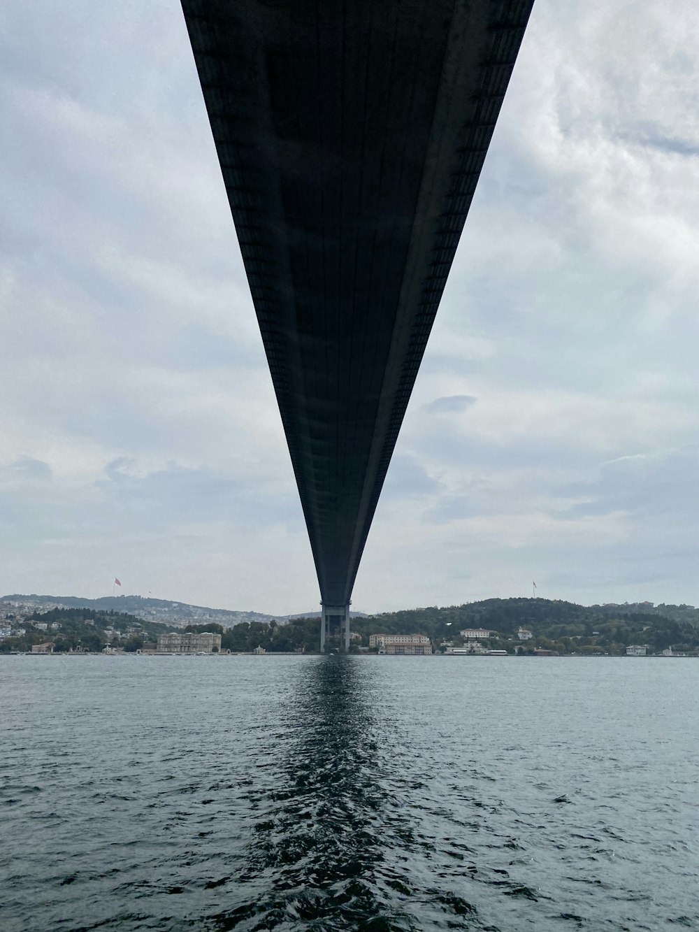 a large black structure above water