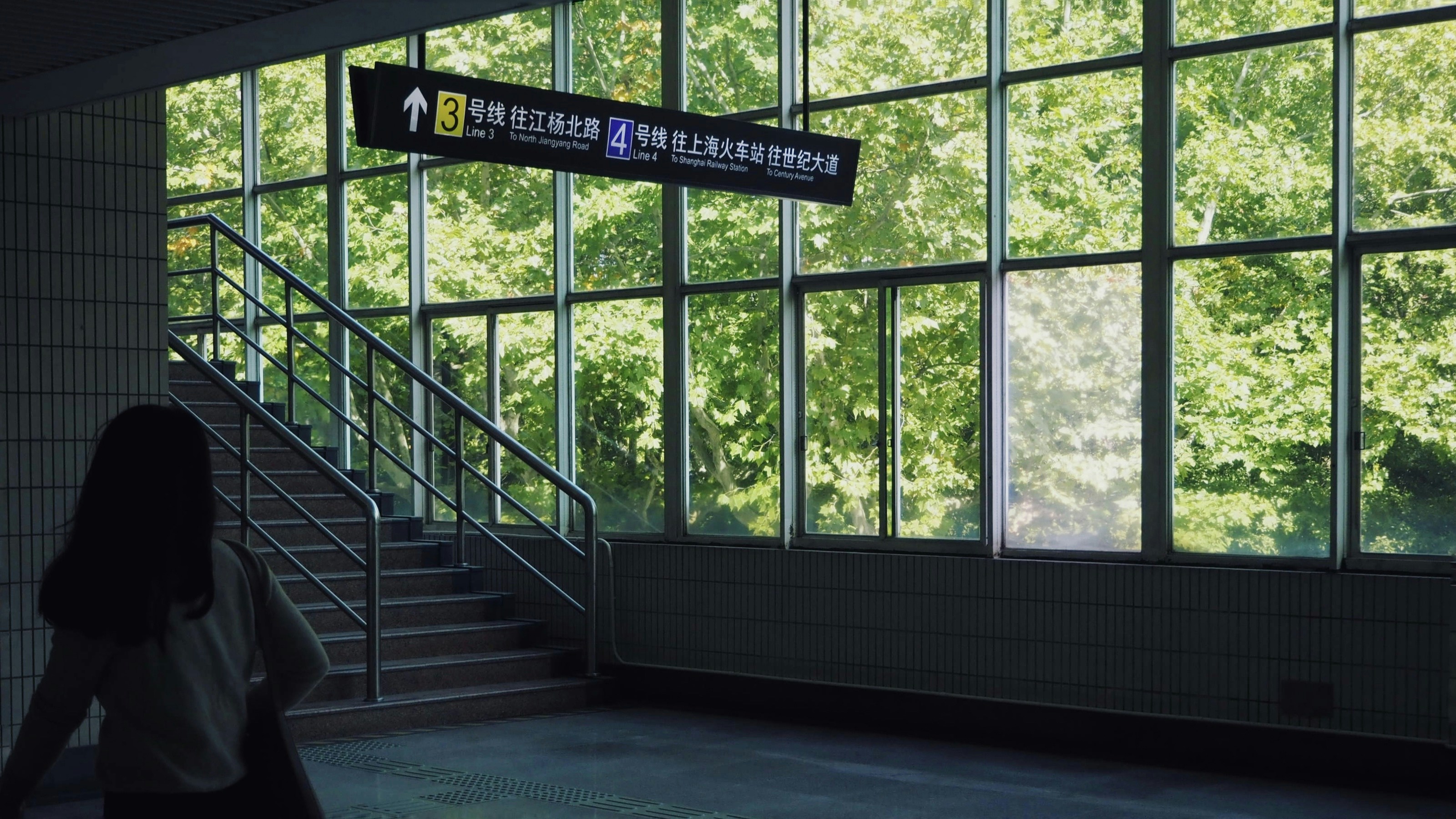 a person walking up a flight of stairs, 