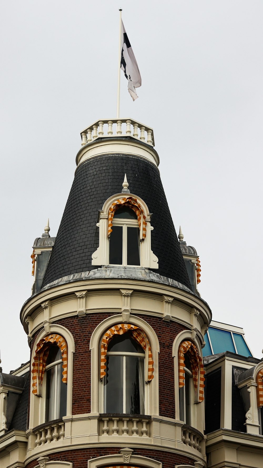 a building with a flag on top