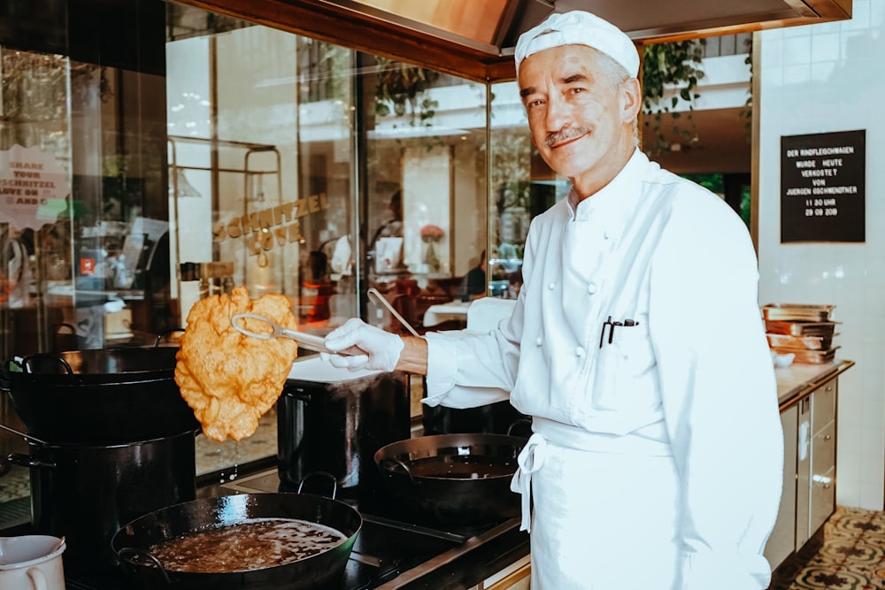 a chef cooking food in a restaurant