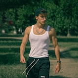 a person wearing a hat and shorts