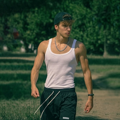 a person wearing a hat and shorts
