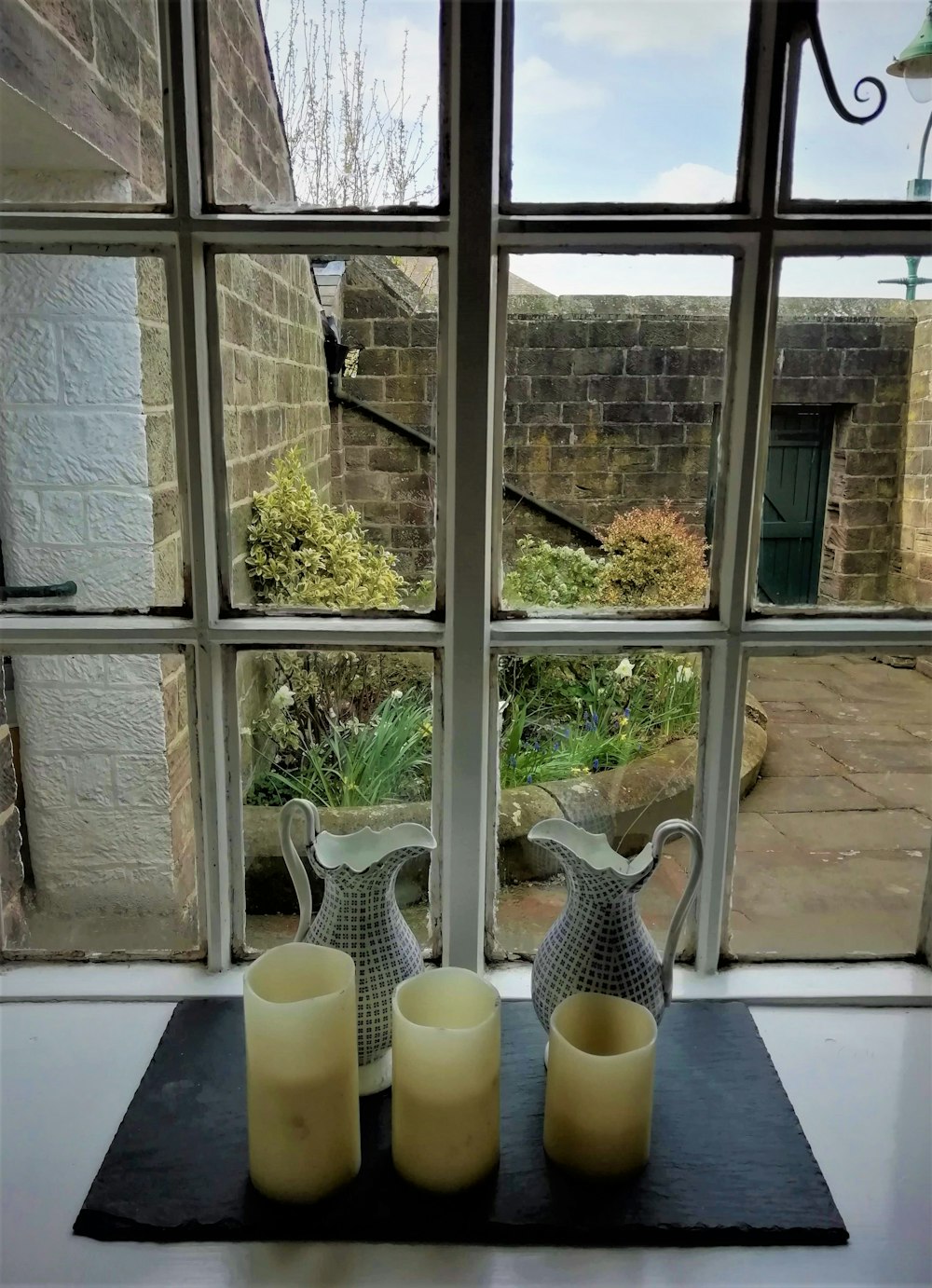 a group of vases sit on a table