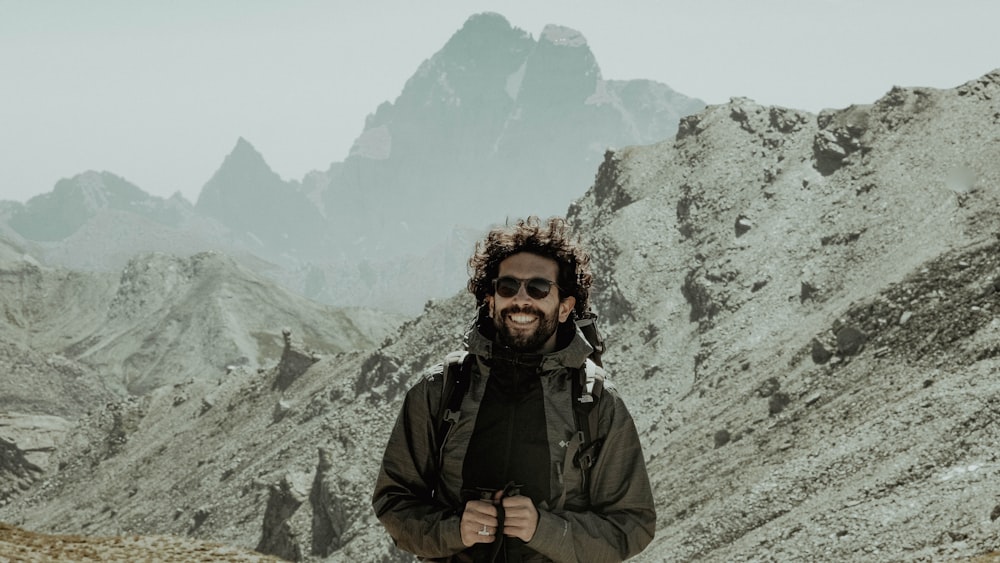 a man standing on a mountain