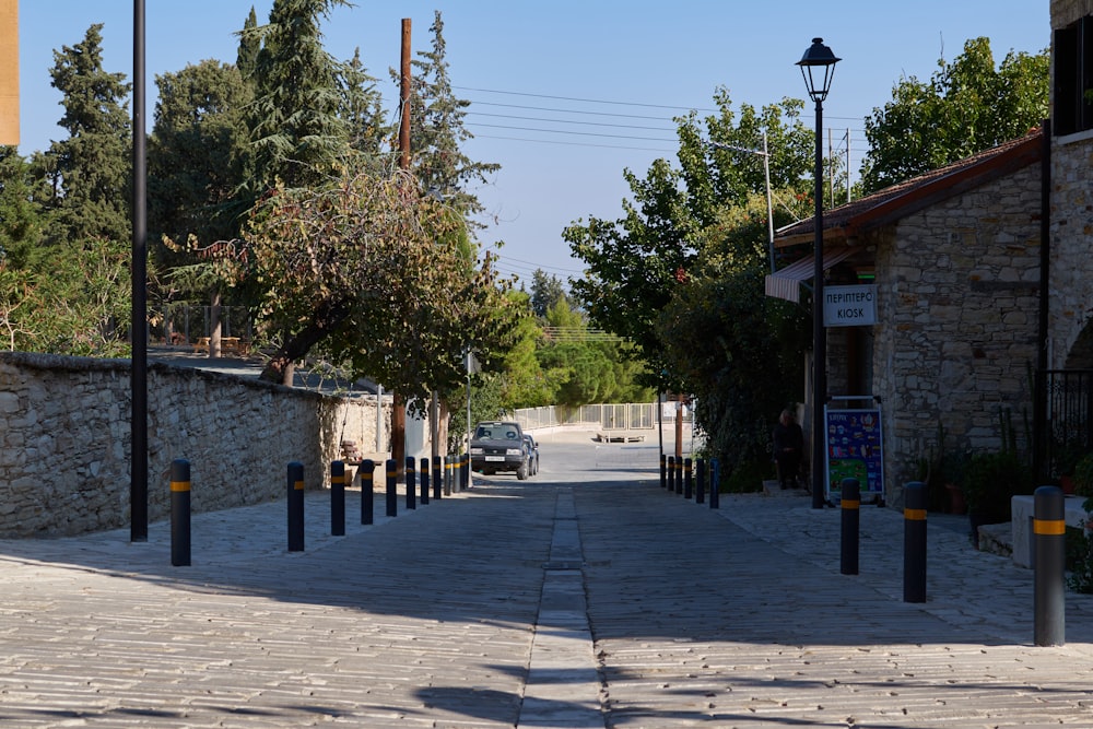 a street with a car parked on the side