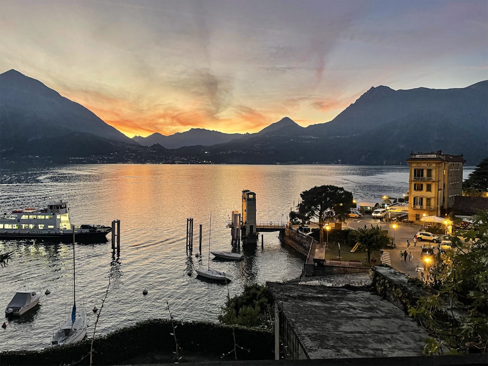 a body of water with boats and buildings along it