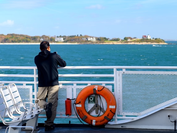 a man standing on a boat