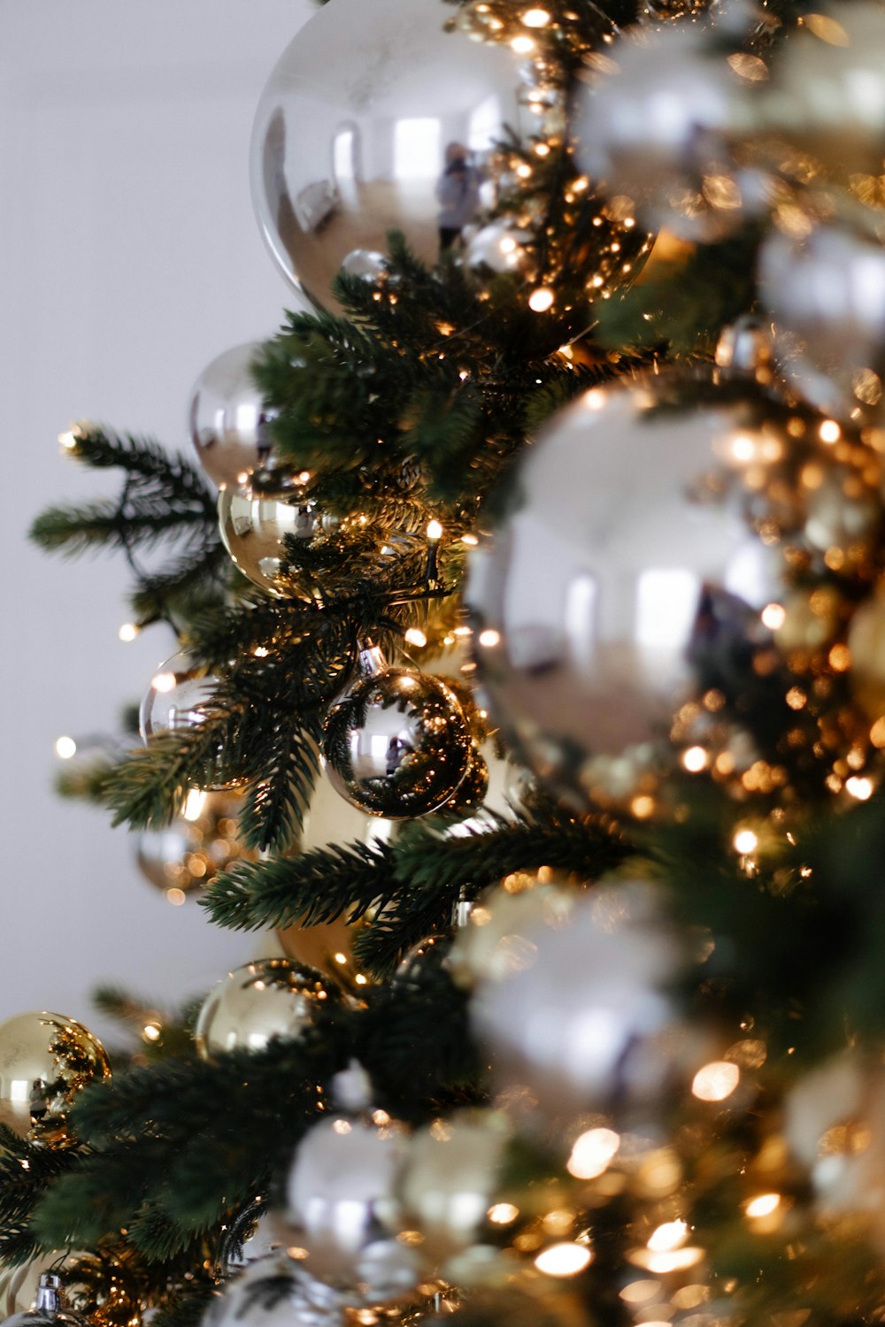 a tree with lights and ornaments