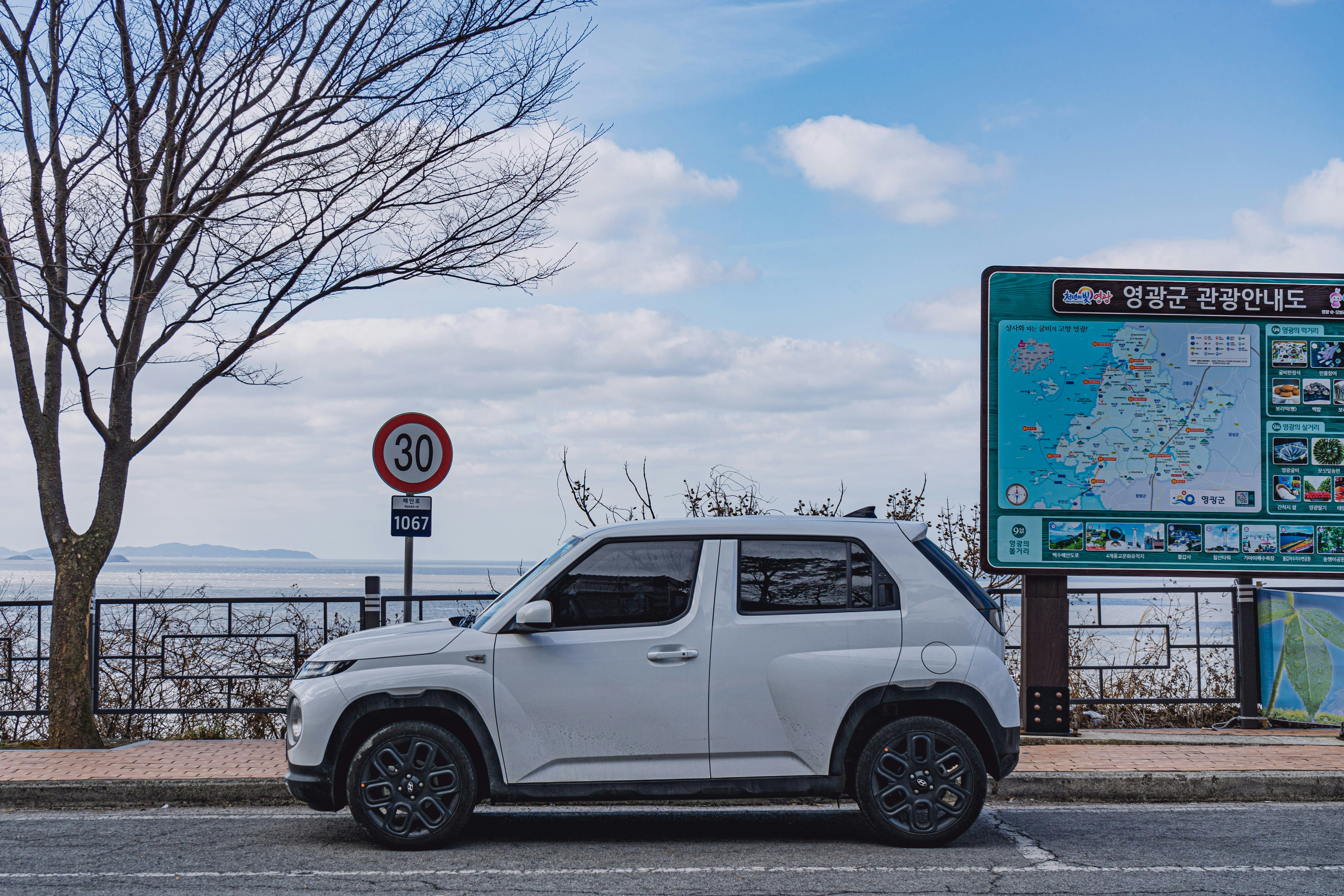 a white van parked on the side of a road