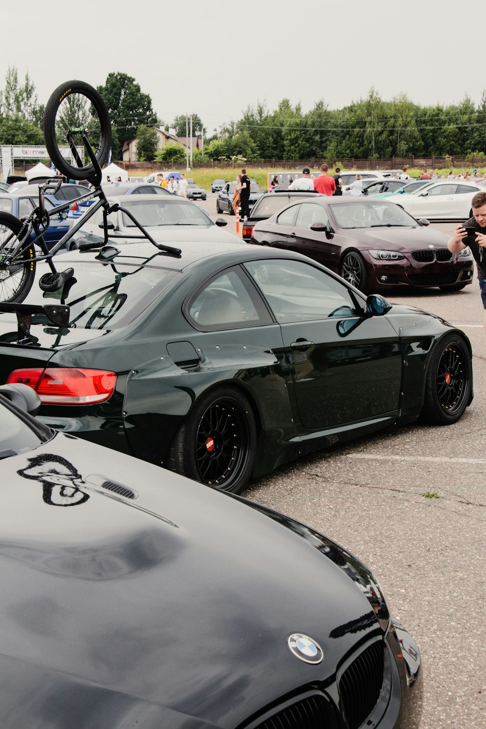 a group of cars parked in a parking lot