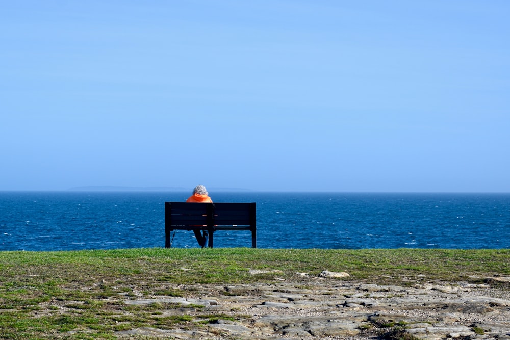 a person sitting on a bench