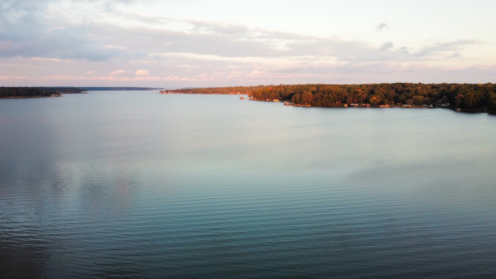 a body of water with land in the distance