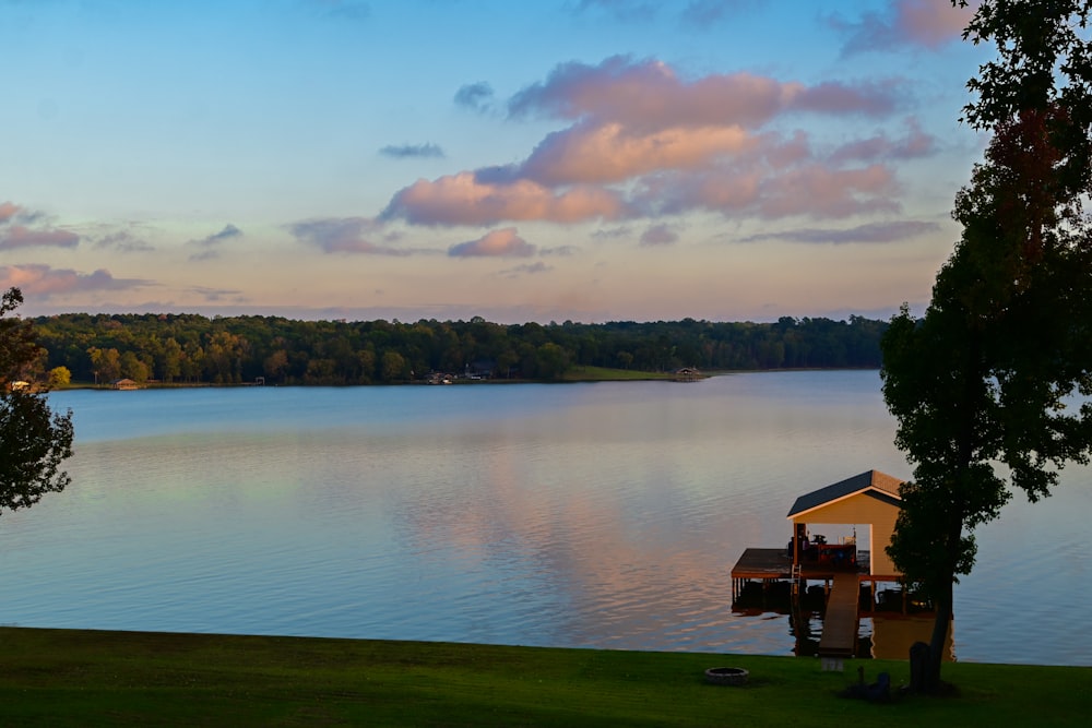 a house next to a lake