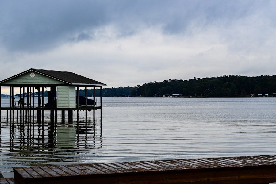 Boathouse and dock on a calm lake, representing Loon Lake