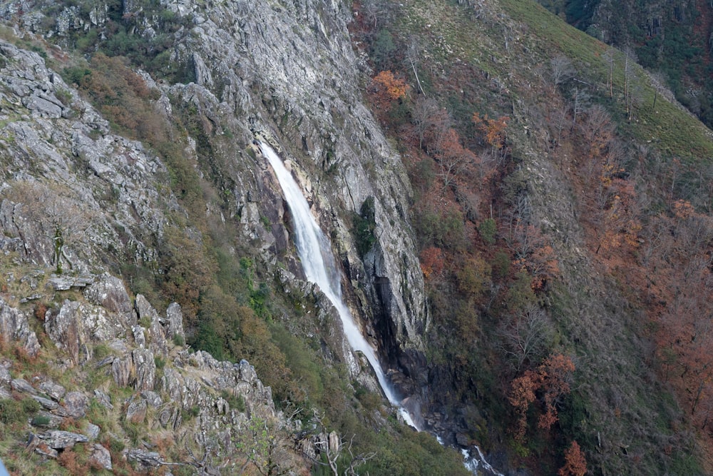 a waterfall in a rocky area