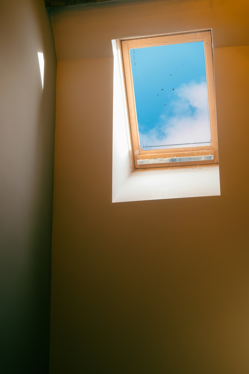 a window with a blue sky