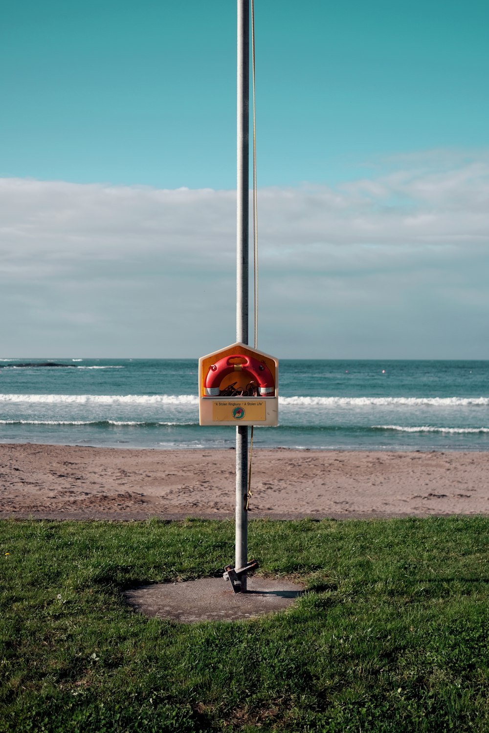 a sign on a beach