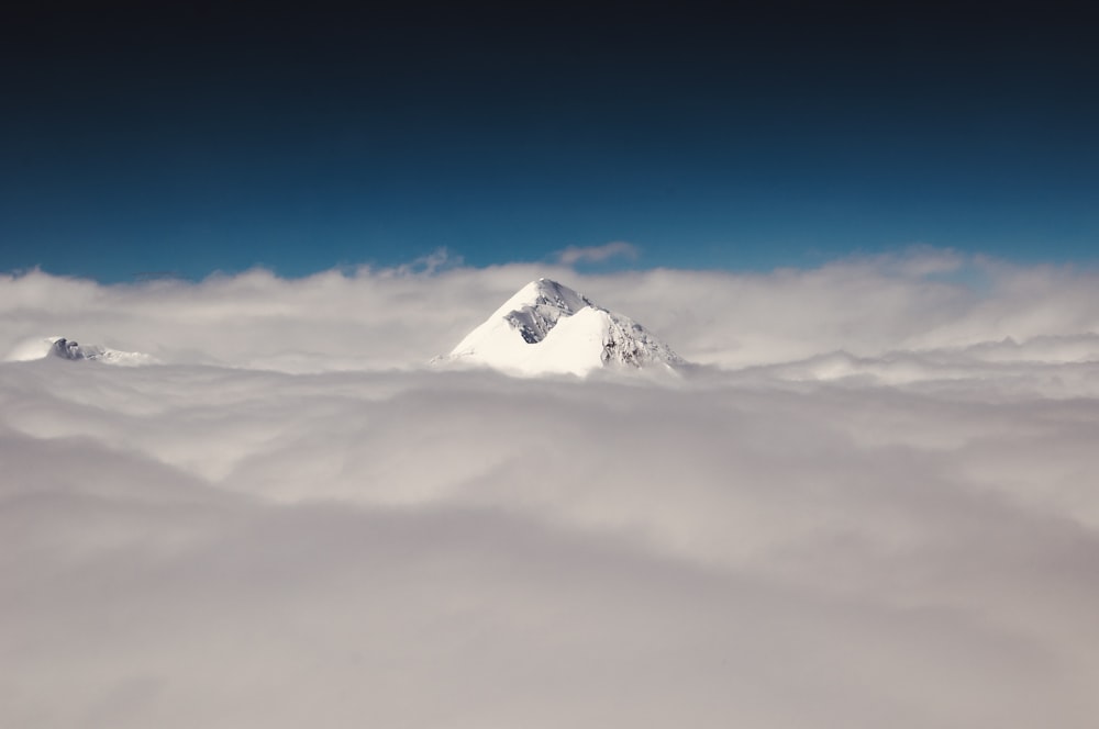 a mountain in the clouds