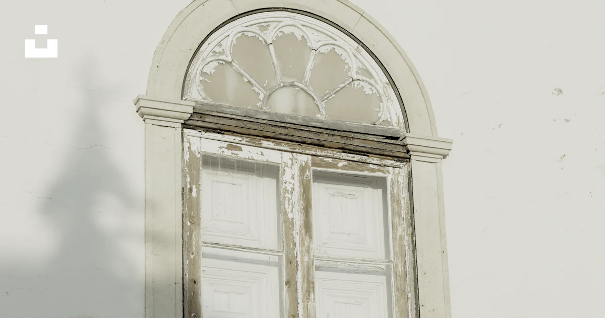 Unsplash Window A window with a design on it photo – Free Window Image on Unsplash