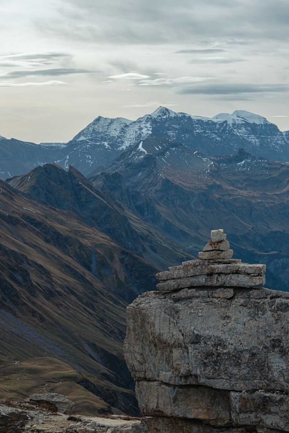 a rocky mountain with snow