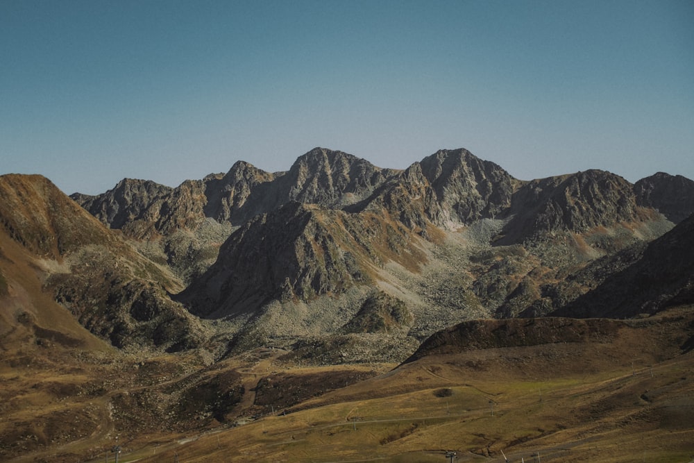 a mountain range with a valley below