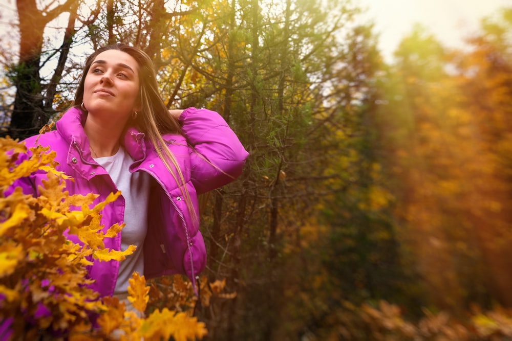 a woman standing in a garden